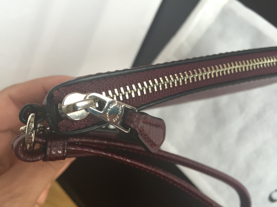 danetigress slg review handbag coach wristlet embossed luxury